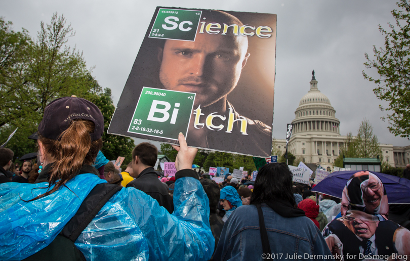 Breaking Bad TV show character Jesse is shown on a sign at the March for Science.