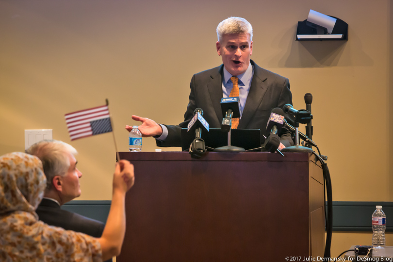 Sen. Cassidy at the podium at one town hall meeting.