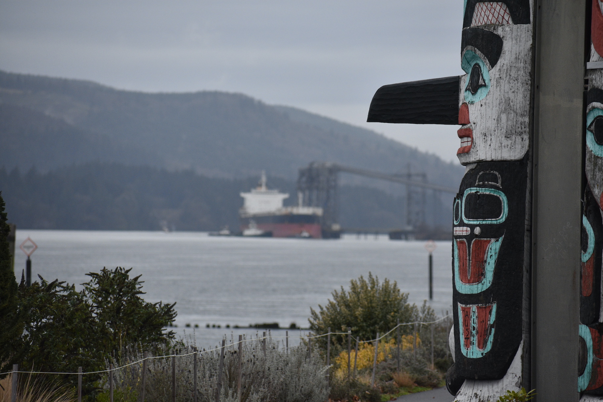 Totem poles carved by now-deceased Chief Lelooska overlook the Columbia River in Kalama, Washington, which sits on the traditional lands of the Cowlitz Indian Tribe and Confederated Tribes of Grand Ronde.