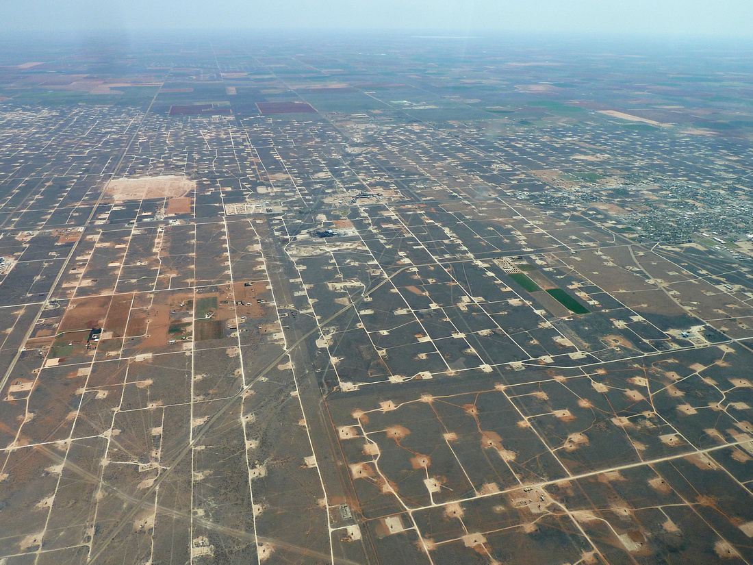 Oil and gas fields form a grid near Midland, Texas, in the Permian shale