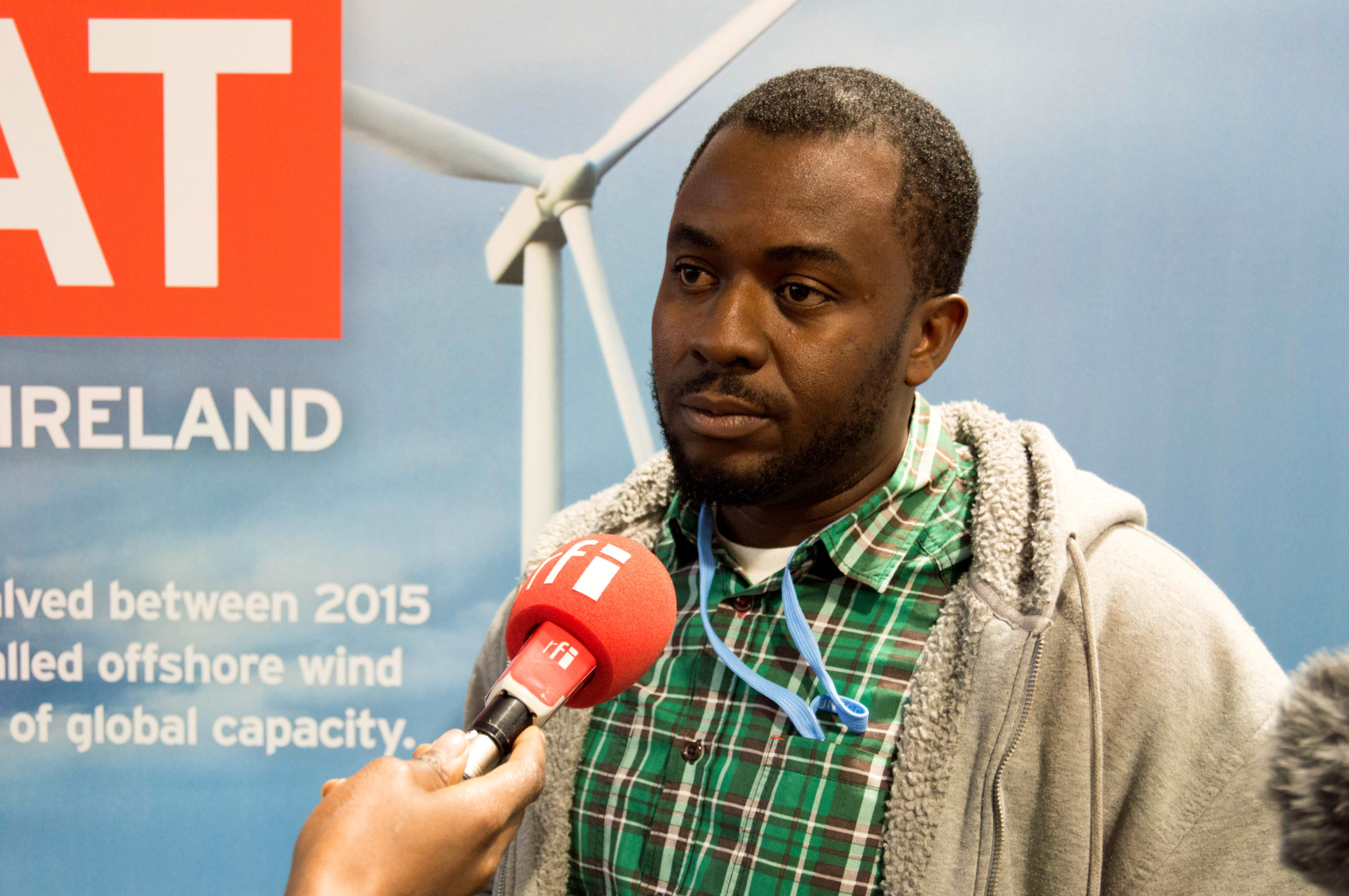 Climate campaigner Babawale Obayanju speaking at the UK's COP24 pavilion