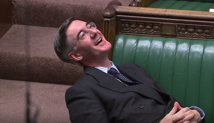 Jacob Rees-Mogg reclining in parliament