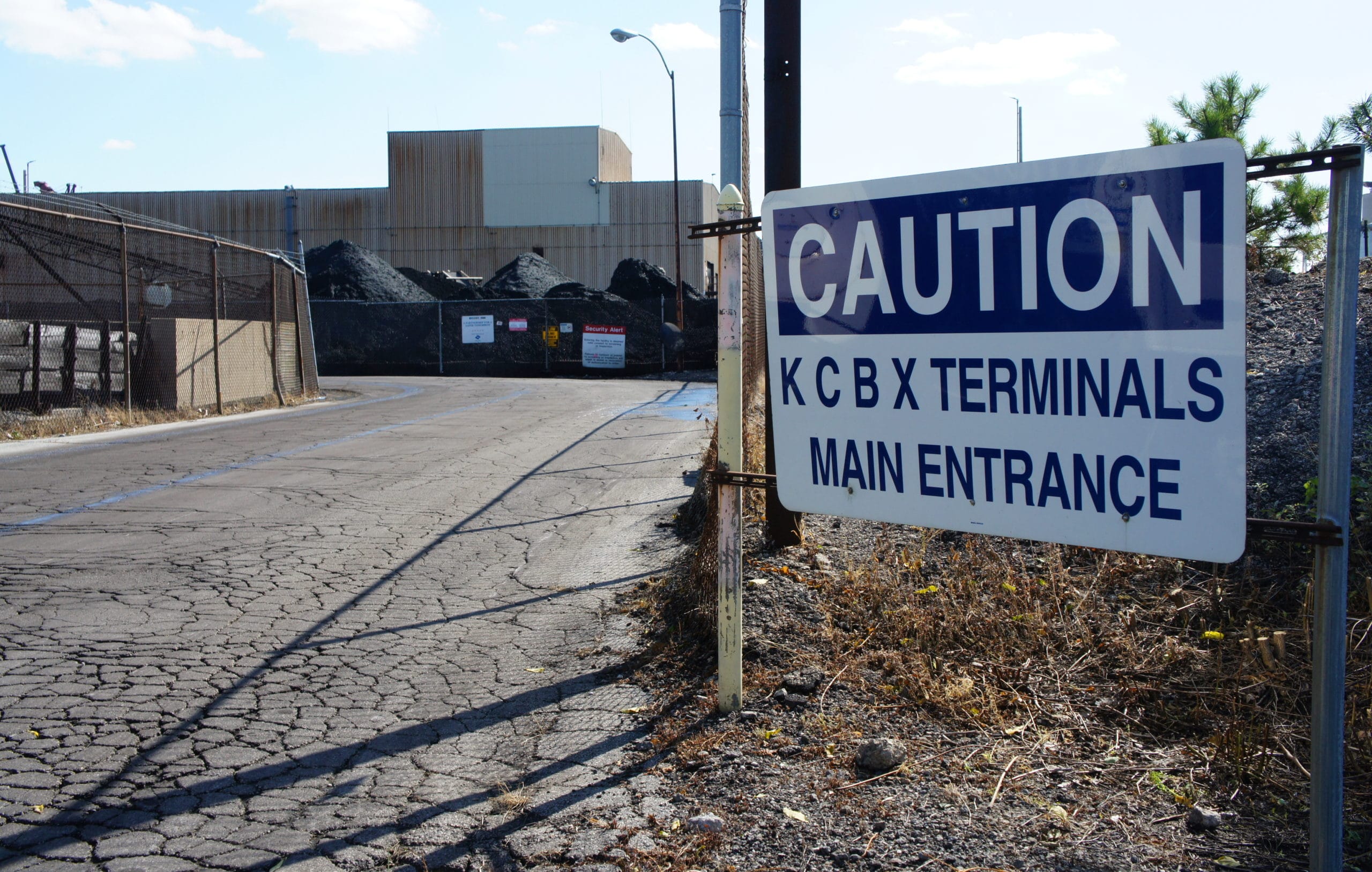 Piles of pet coke at the East 100th Street entrance to the KCBX terminal.