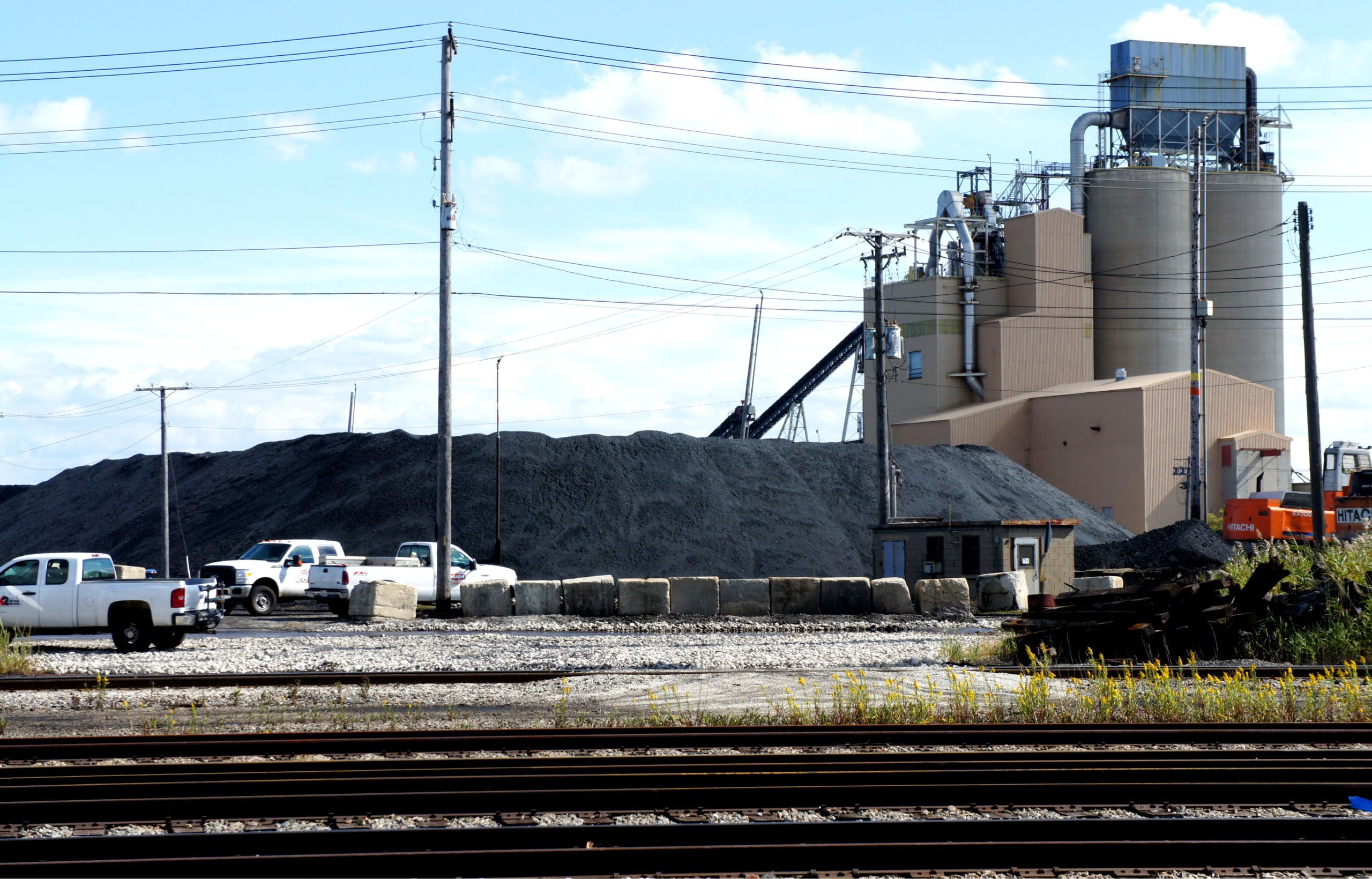 A view of the Koch brothers' pet coke piles from the property line of a resident in the Slag Valley neighborhood of Southeast Side Chicago.