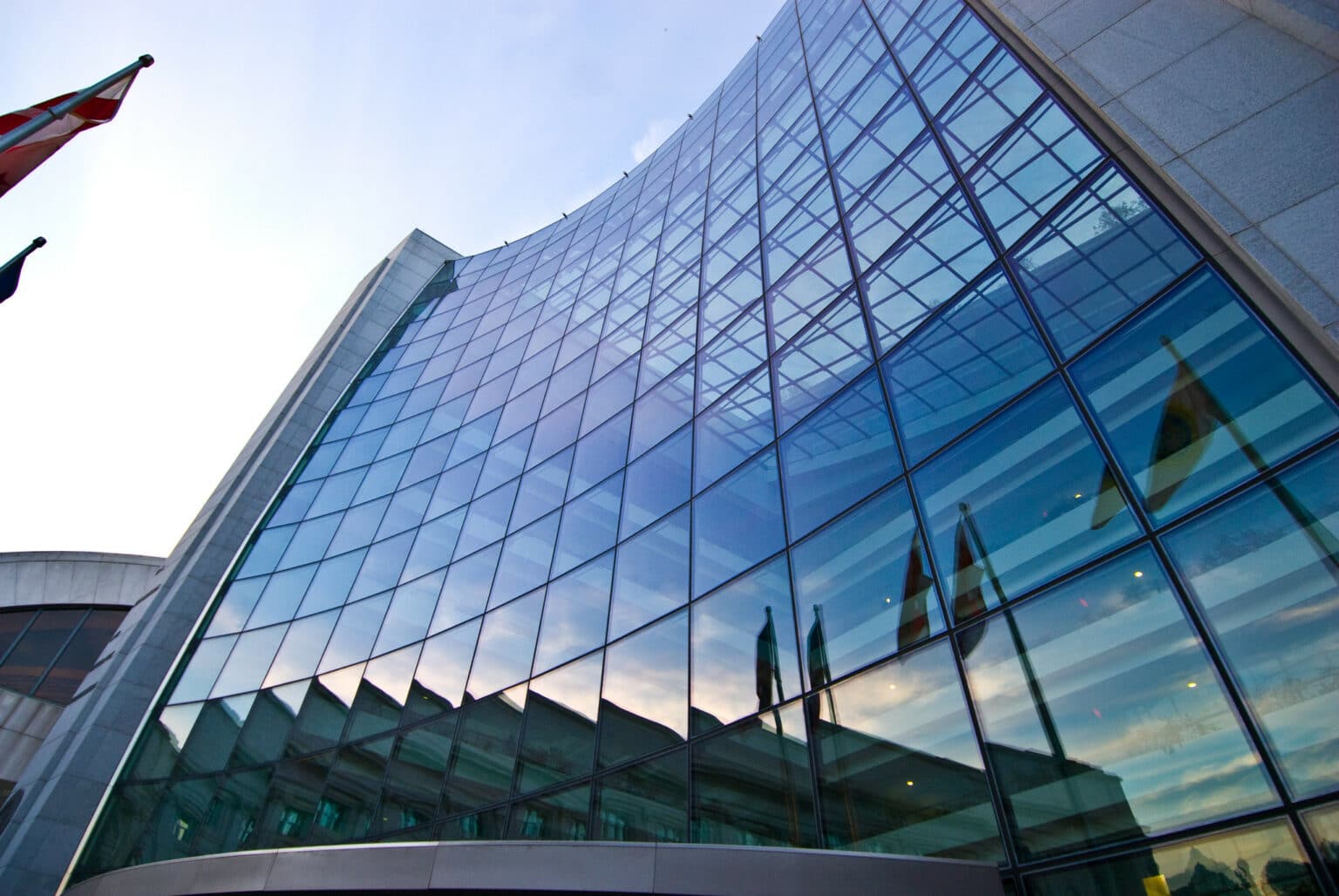 Tall slightly curved glass office building