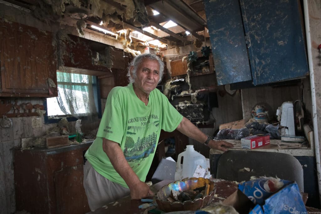 Edison Dardar in what remains of his home on the Isle de Jean Charles