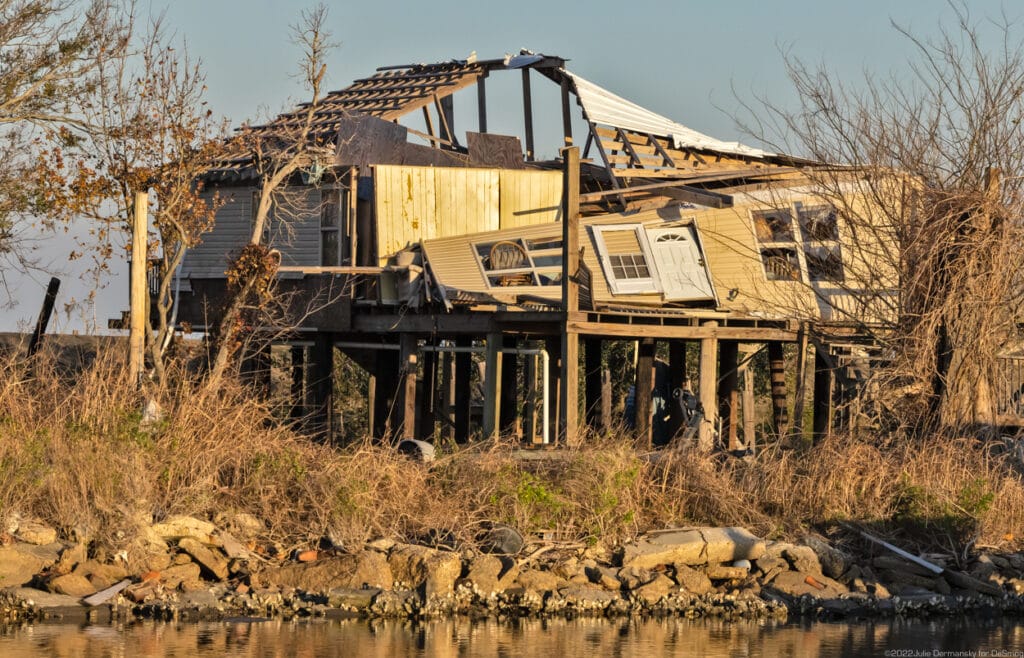 Hurricane Ida damaged home across from the Pointe-au-Chien Indian Tribe at the Tribe's center on February 15. Credit: Julie Dermansky