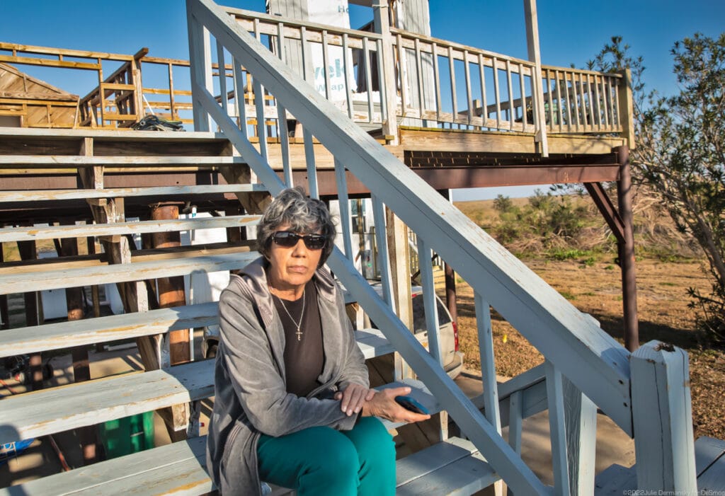 Shirley Verdin on the steps of what remains of her home on February 15. Credit: Julie Dermansky