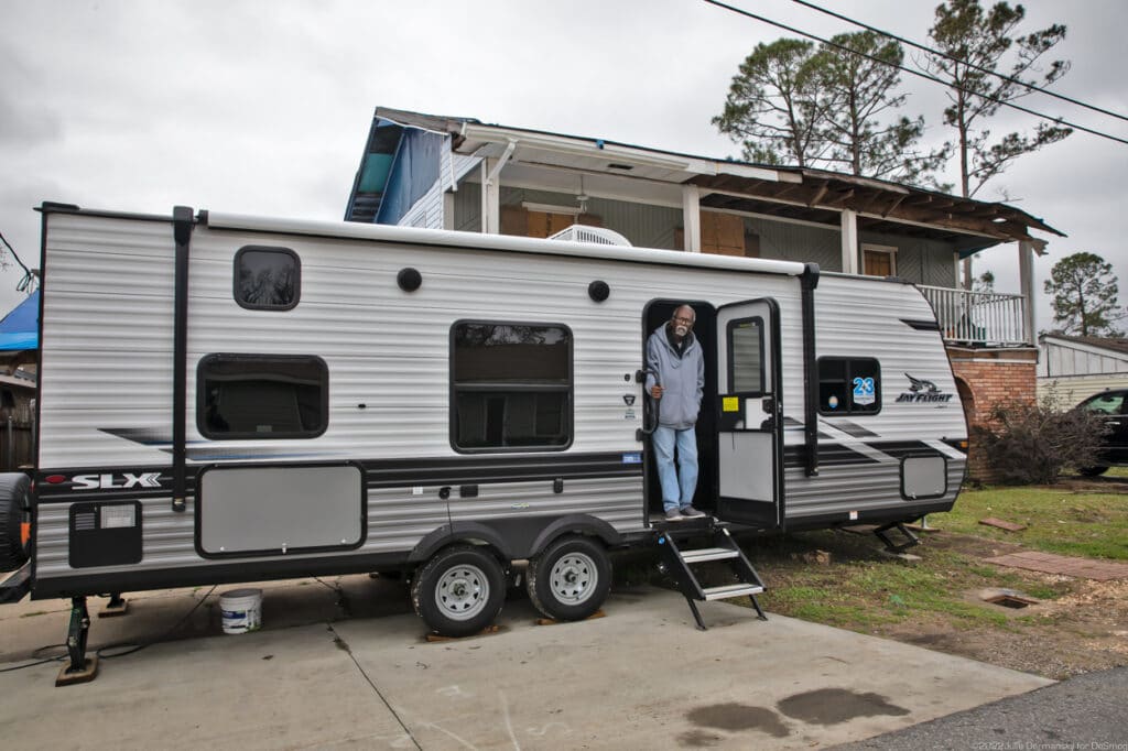 Robert Taylor coming out of the trailer provided to him, his son, and his granddaughter, in Reserve, LA, on February 27. Credit: Julie Dermansky