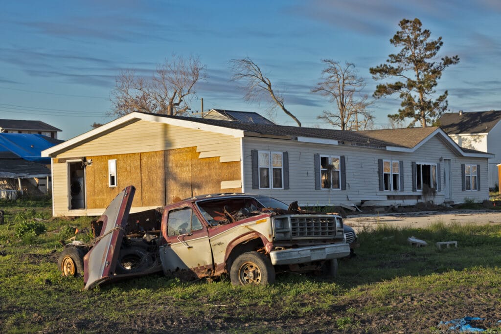 Totaled car and destroyed home in Ironton, LA, on February 27. Credit: Julie Dermansky