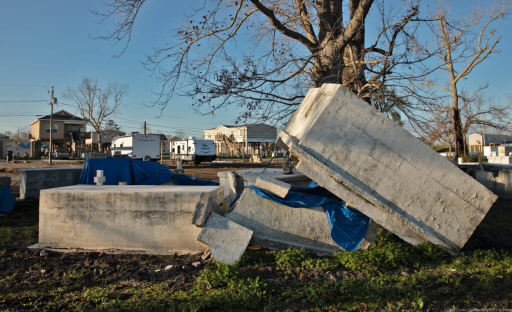 Tombs displaced by a storm surge in a cemetery in Ironton on February 27. Credit: Julie Dermansky