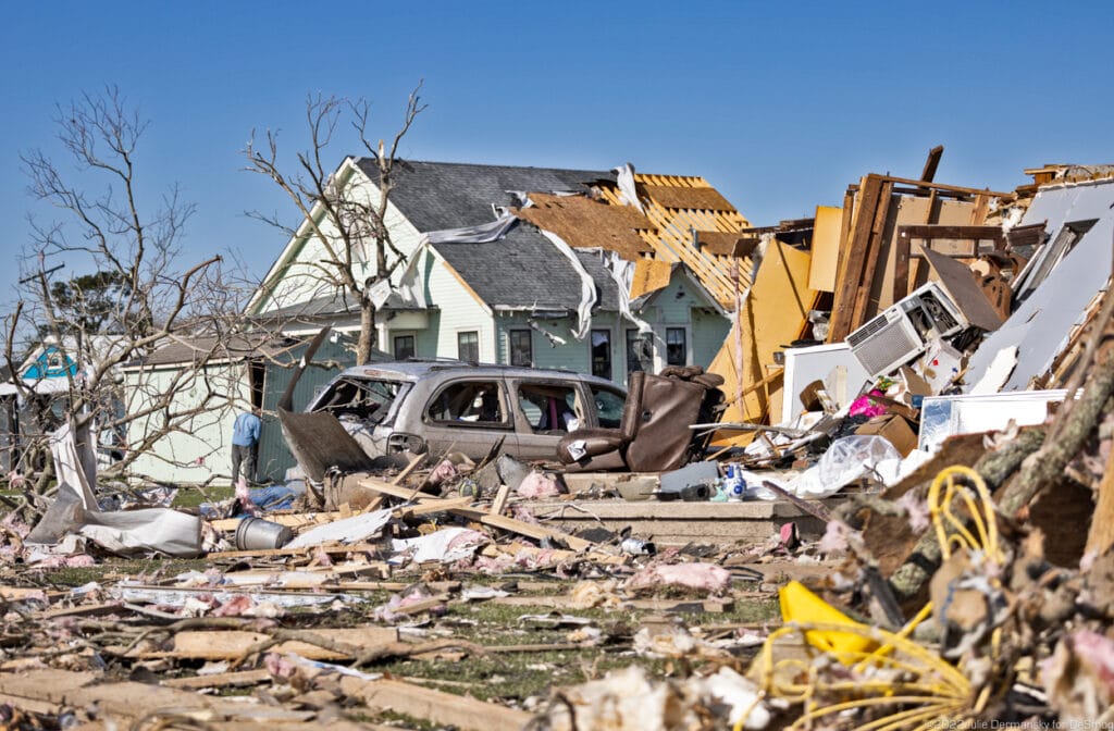 Totaled homes line Rose and Benjamin Streets in Arabi, Louisiana.