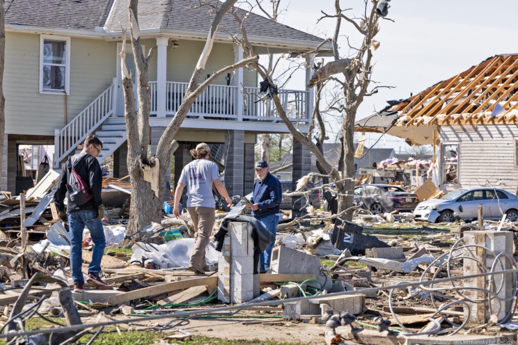 Bob Lambert (in the blue baseball cap) where his grandson Connor’s house stood before the EF3 tornado hit Arabi, Louisiana.