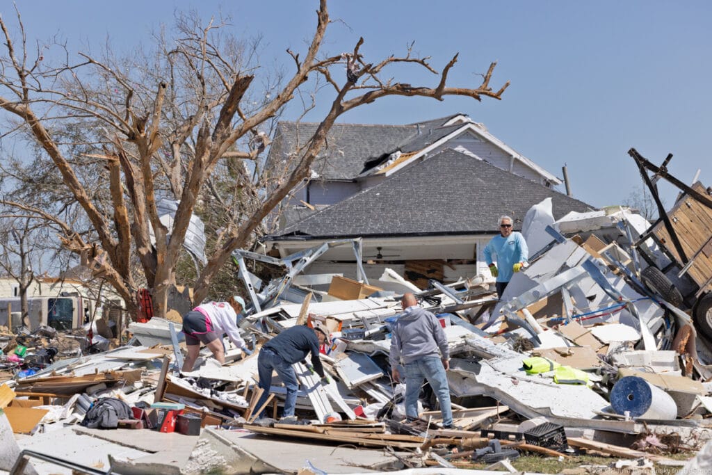 A family search for their belongings in their totaled home on March 23.