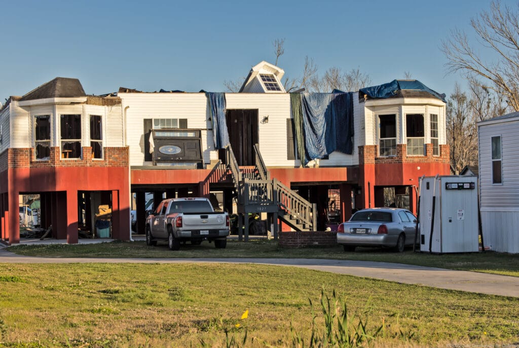 FEMA trailer next to a badly damaged home in Terrebonne Parish. Credit: Julie Dermansky.