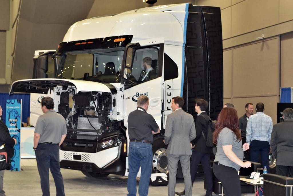 Attendees gather around the Nikola Tre FCEV truck at the 2022 Canadian Hydrogen Convention in Edmonton, Canada. Credit: Danielle Paradis