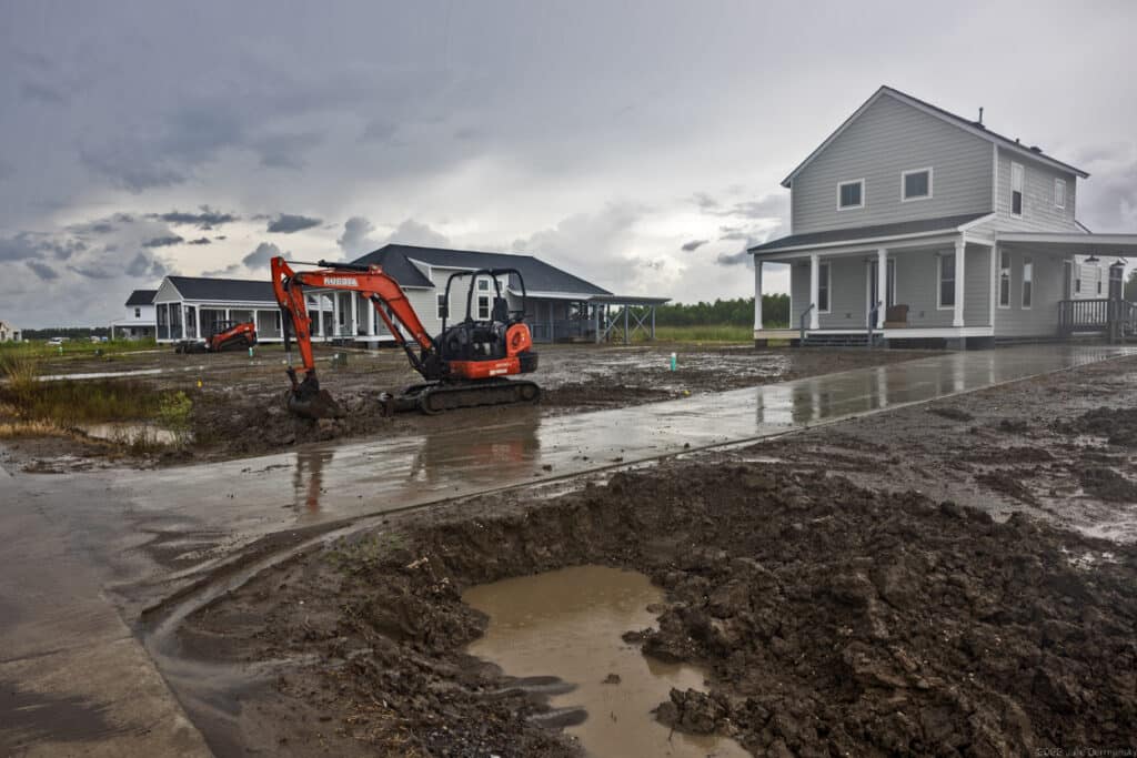 The New Isle site after a short heavy downpour on August 24, after the first closings took place. Climate scientist predict heavier more frequent downpours as the climate continues to heat up.