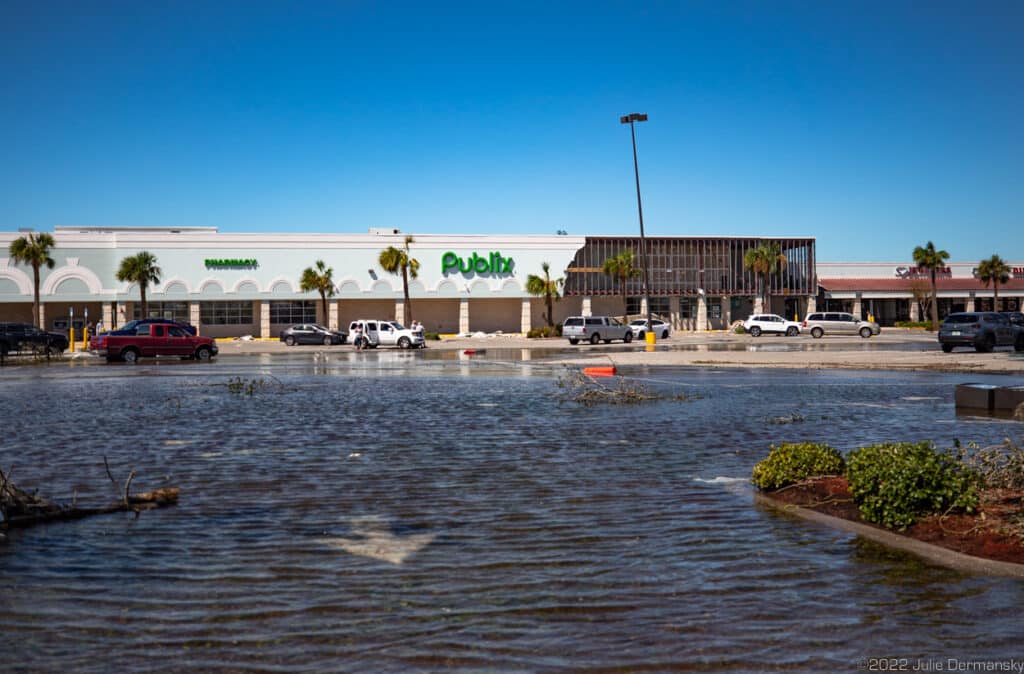 Floodwaters in a damaged Publix supermarket parking lot in Englewood, Florida.