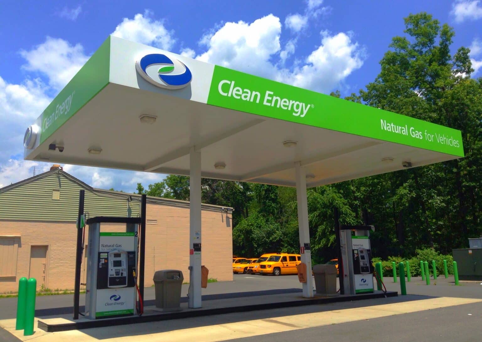 Green branded fueling station for cars that reads 'clean energy' and 'natural gas for vehicles'