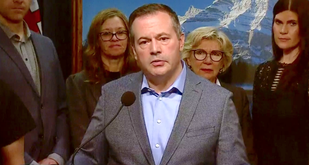 Vivian Krause (centre left) appears with Alberta Premier Jason Kenney for Energy War Room presser. Image: Facebook Live