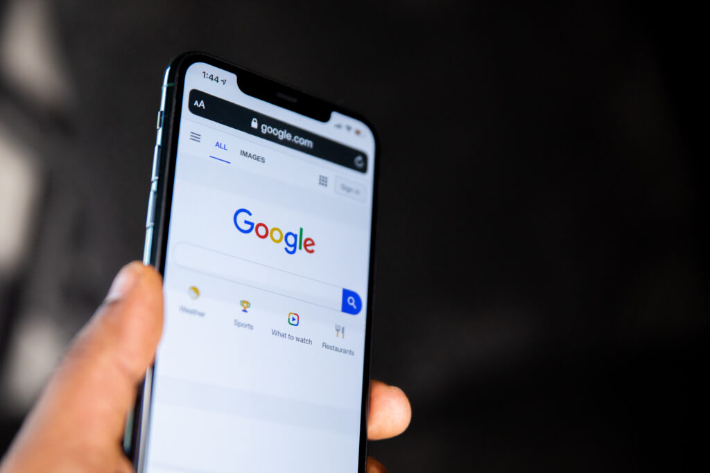 Google homepage displayed on a phone