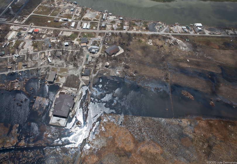 Aerial view of damaged homes and oil sheen from Hurricane Laura in south Louisiana in September 2020.