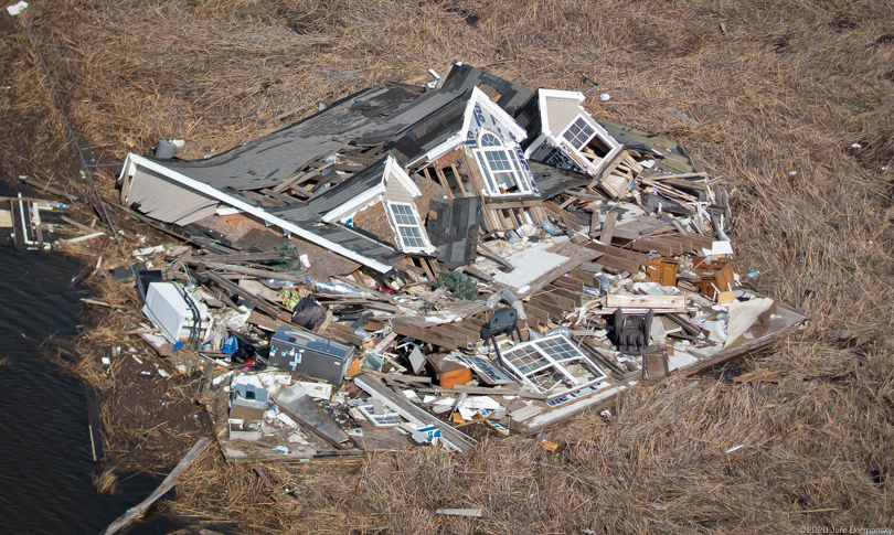 Home crushed in the wetlands in Cameron Parish after Hurricane Delta in October 2020.