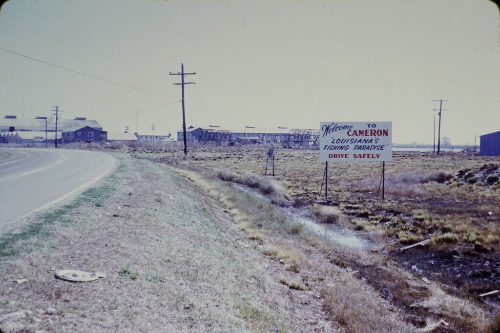 A photograph of Cameron, signposted “Louisiana’s fishing paradise,” from cerca 1970, decades before the birth of the Louisiana LNG industry.