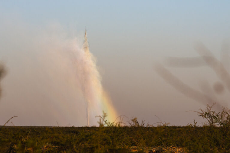 An oil well blowout shooting a mixture of oil, water, and gas over 100 feet in the air west of Toyah, Texas on October 4, 2024.