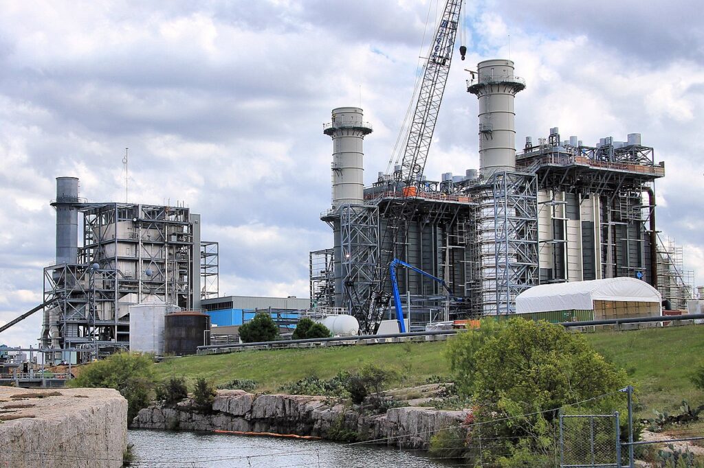 Natural gas power plant under construction on a river bank in Texas.