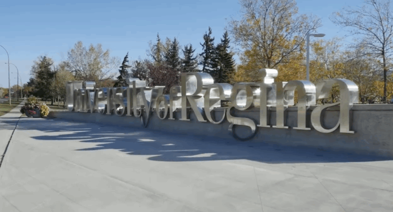 A silver sign reads "University of Regina"