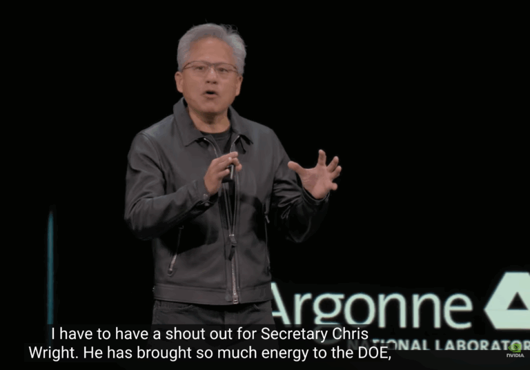 Video still of Nvidia CEO Jason Huang's keynote speech at an October AI conference. The English caption reads, "I have to have a shoutout for Secretary Chris Wright. He has brought so much energy to the DOE."