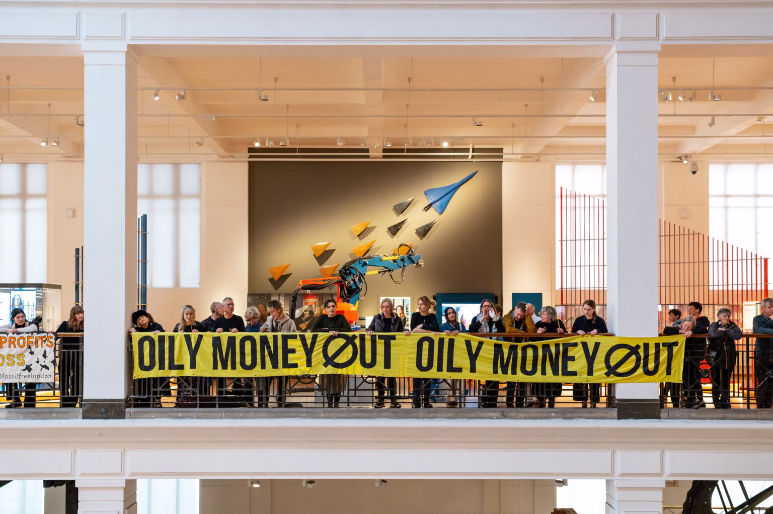 During a 2024 protest against the Science Museum's fossil fuel-related sponsorships, activists with the climate campaign group Extinction Rebellion unfurled a banner reading "Oily Money Out" over an interior balcony.