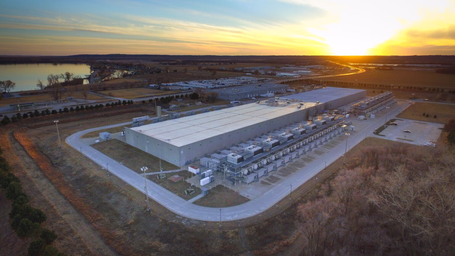 An aerial view of a Google data center in Iowa at twilight