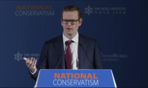 Attorney Will Chamberlain addresses the National Conservatism Conference in Jerusalem on Oct. 8, 2026.