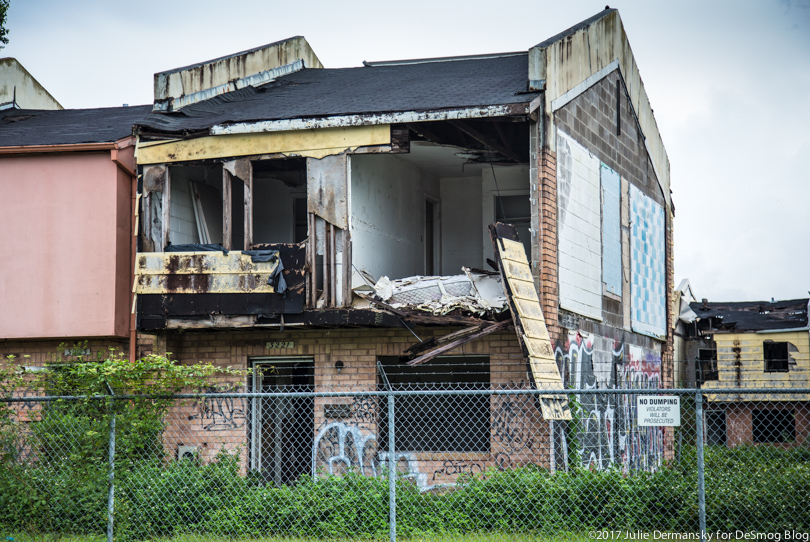 The inside of a Press Park housing unit exposed to the outside from missing walls