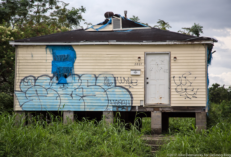 A home covered in graffiti in New Orleans' Ninth Ward