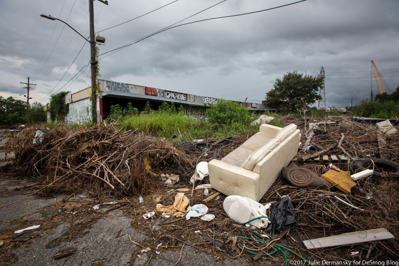 Debris and trash outside a Ninth Ward strip mall abandoned since Hurricane Katrina