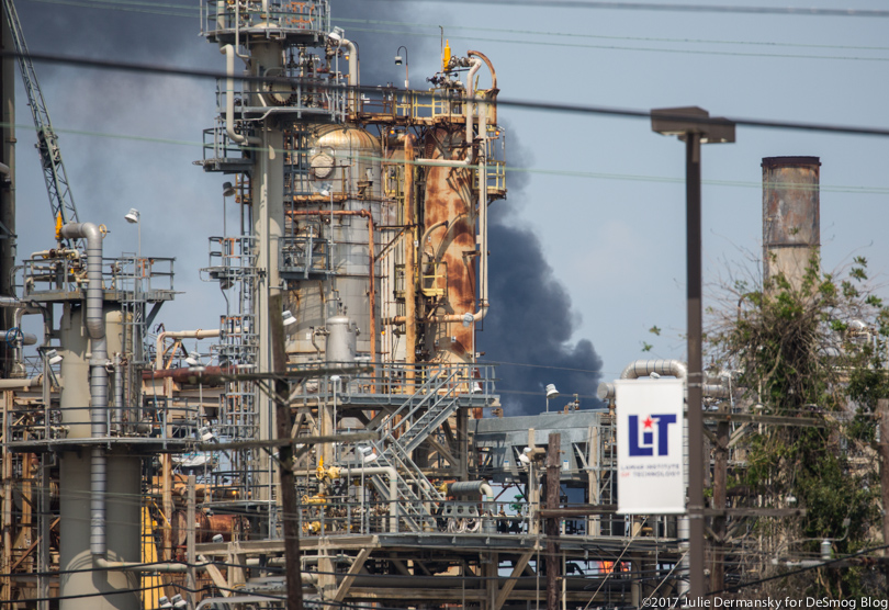Exxon refinery in Beaumont, Texas, with a plume of black smoke