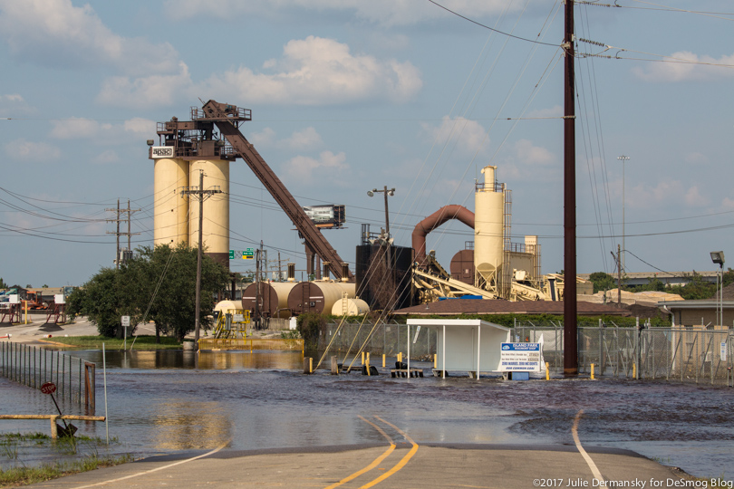 A flooded bridge to a flooded pipe manufacturing plant in Beaumont, Texas