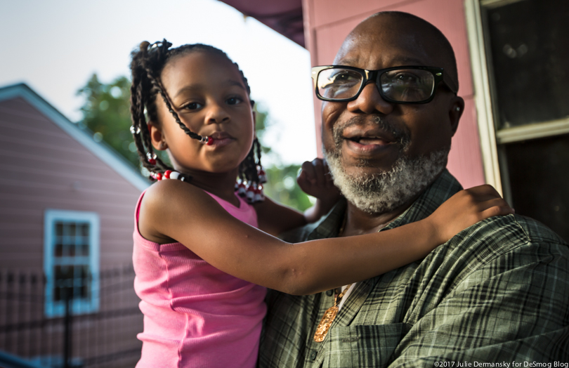 Hilton Kelley holds his granddaughter