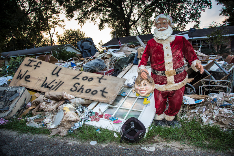 Contents of a flooded home in Denham Springs out on the curbside. 