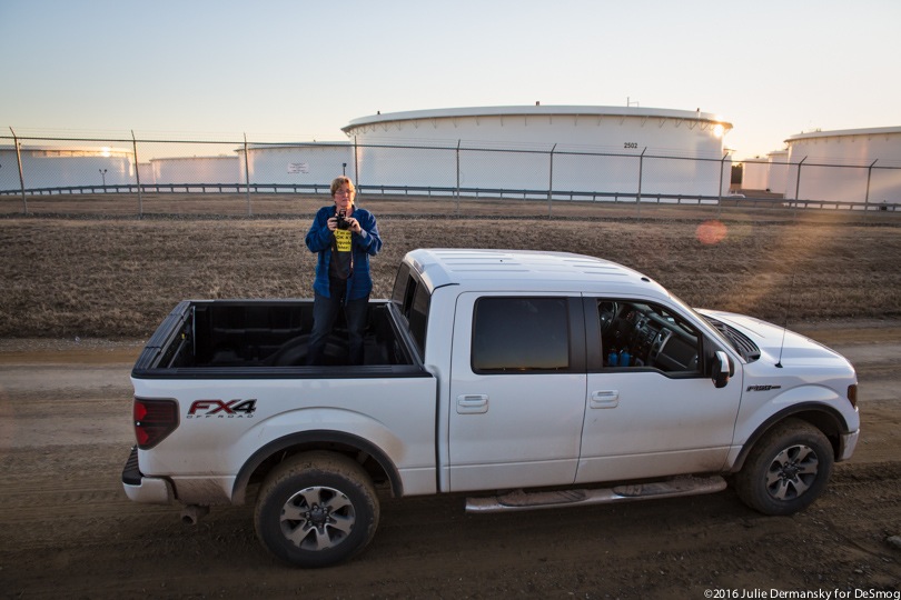 Woman standing in the back of her truck