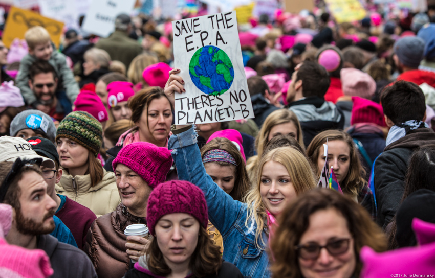Woman holding 'Save the EPA. There's no planet B' sign at Women's March