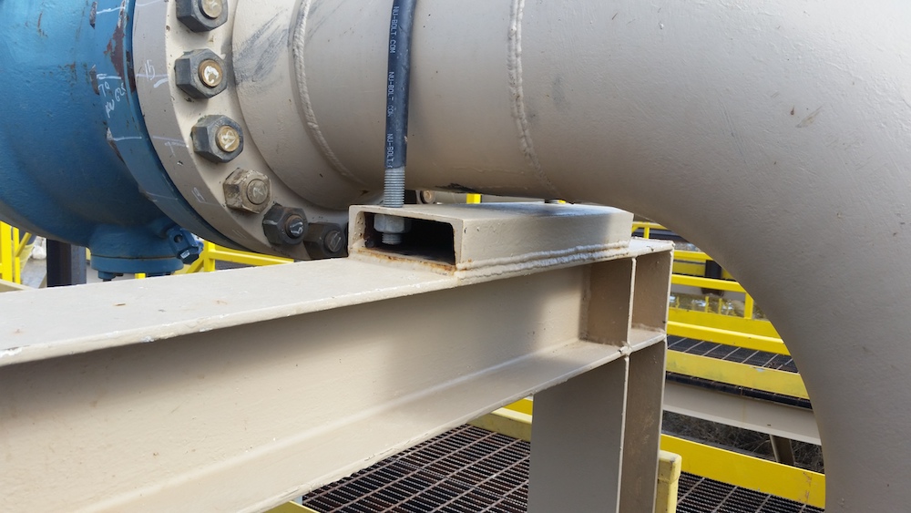 Visible air gap between pipe and support beam at ONEOK's Lonesome Creek gas processing plant in Alexander, North Dakota.