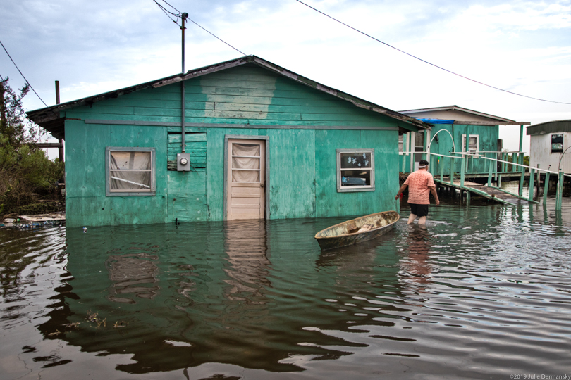 Resident of Isle de Jean Charles returning to his home after Tropical Storm Barry