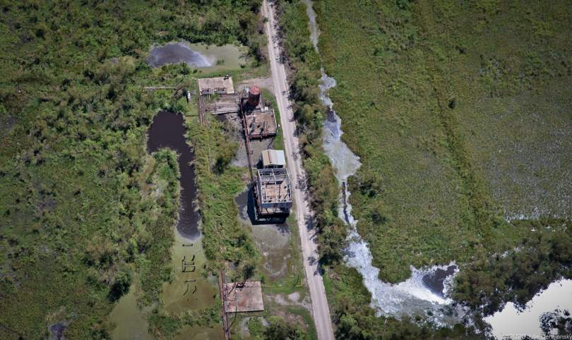 Oil sheen near an oil and gas production site in New Iberia Parish following Hurricane Laura.