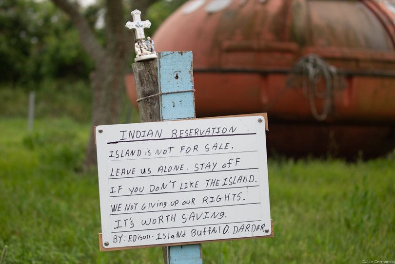 Sign across the road from Edison Dardar's house