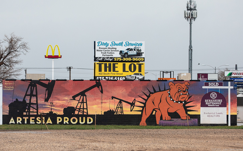 Mural in Artesia, New Mexico, showing pride with pumpjacks 