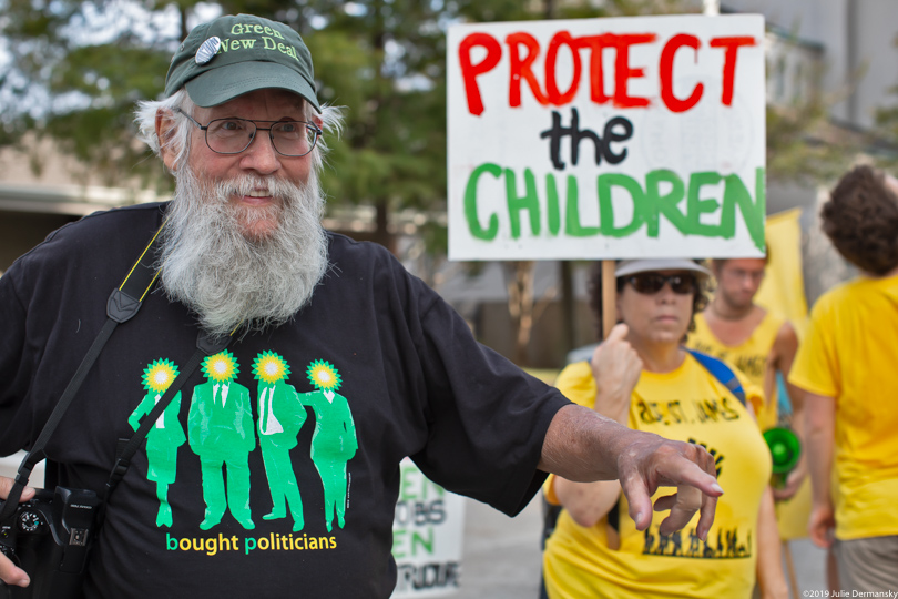 Daryl Malek-Wiley of New Orleans Sierra Club with Coalition Against Death Alley marchers